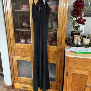 Black long dress with lace detail.